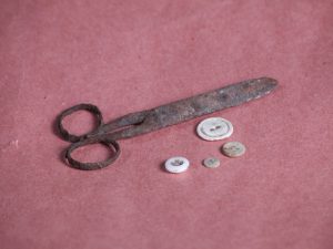 Scissors, metal and Hand-made Shell Buttons (likely locally produced), c. late 1850s.